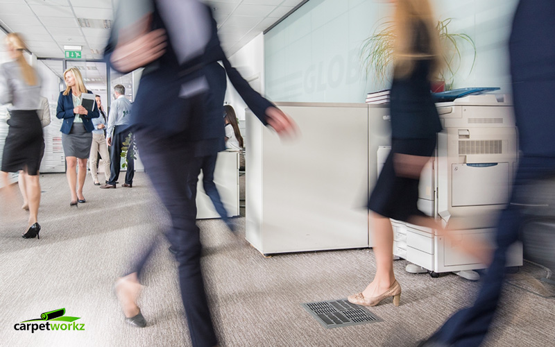 Business people striding in convention center