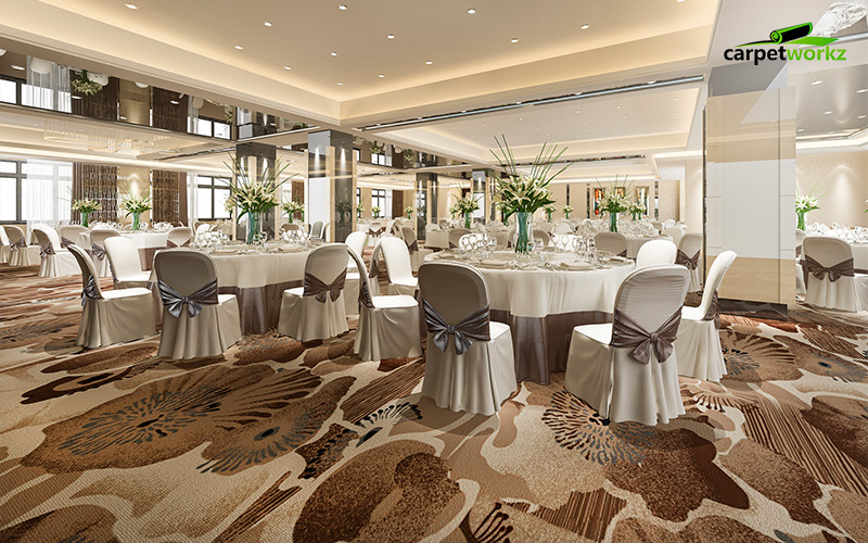 Elegant banquet hall with patterned flooring and round tables